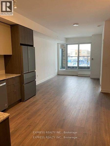 225 - 100 Eagle Rock Way, Vaughan, Ontario  L6A 5B9 - Photo 2 - N12733468