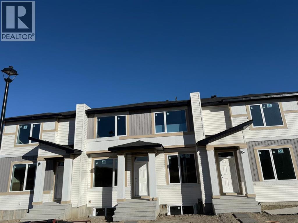 1999 Mccaskill Drive, Crossfield, Alberta  T0M 0C1 - Photo 4 - A2255750