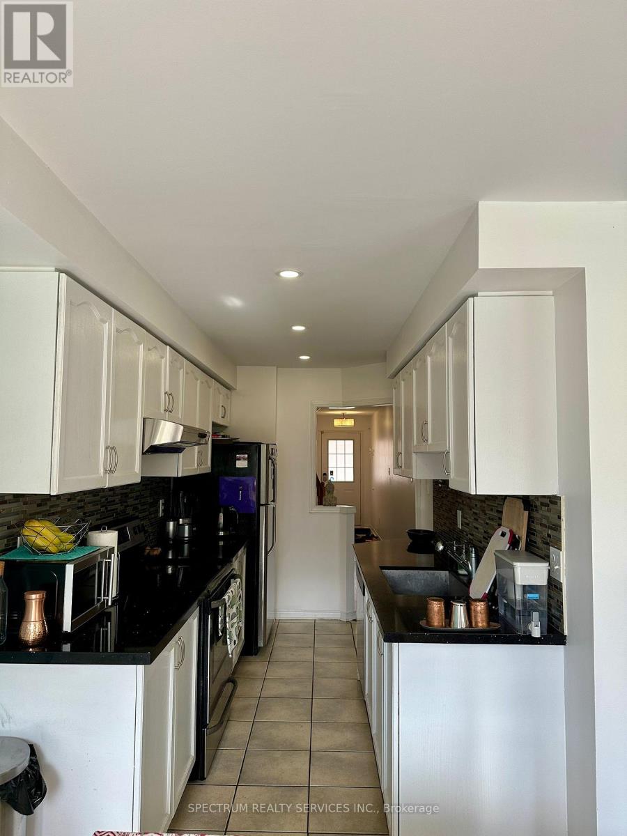 108 - 770 Othello Court, Mississauga, Ontario  L5W 1Y3 - Photo 2 - W12733712