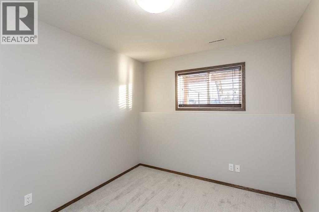 92 Iron Wolf Boulevard, Lacombe, Alberta  T4L 0C7 - Photo 19 - A2277033