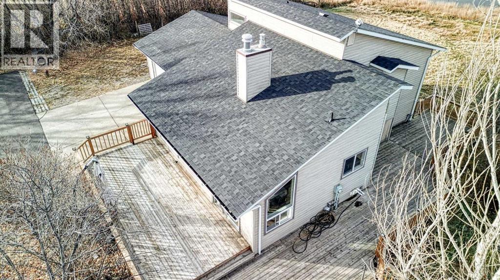 247 Shore Drive, Rural Rocky View County, Alberta  T2M 4L5 - Photo 45 - A2262909