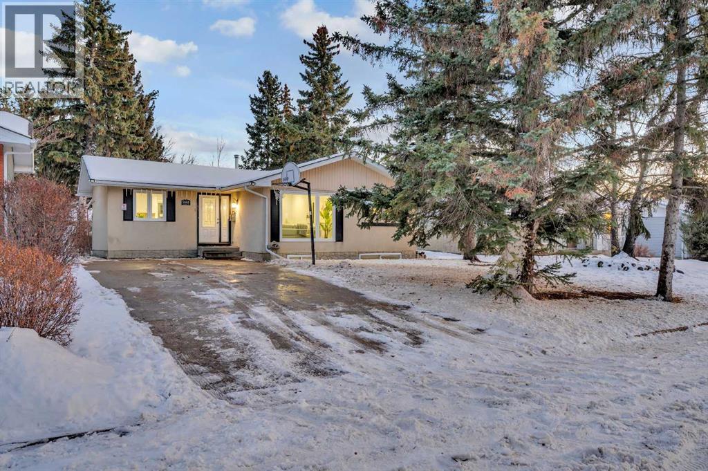 5868 Dalcastle Drive Nw, Calgary, Alberta  T3A 2B6 - Photo 2 - A2281027