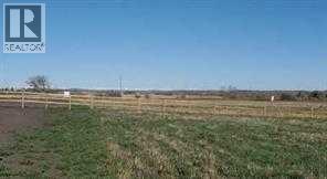 48038 295 Avenue E, De Winton, Alberta  T0L 0X0 - Photo 1 - A2282124