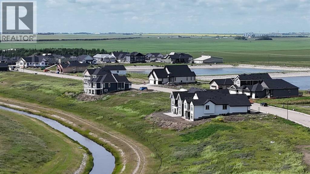 323 Muirfield Crescent, Lyalta, Alberta  T0J 1Y1 - Photo 4 - A2239622