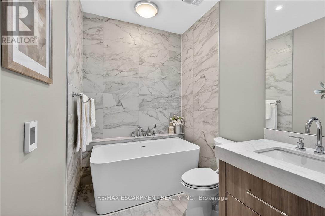 401 - 123 Maurice Drive, Oakville, Ontario  L6K 2W6 - Photo 21 - W12733926