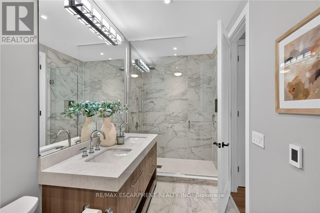 401 - 123 Maurice Drive, Oakville, Ontario  L6K 2W6 - Photo 22 - W12733926