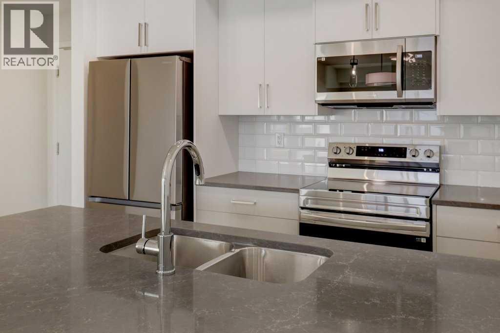 124, 245 Edith Place Nw, Calgary, Alberta  T3R 2C9 - Photo 7 - A2275305