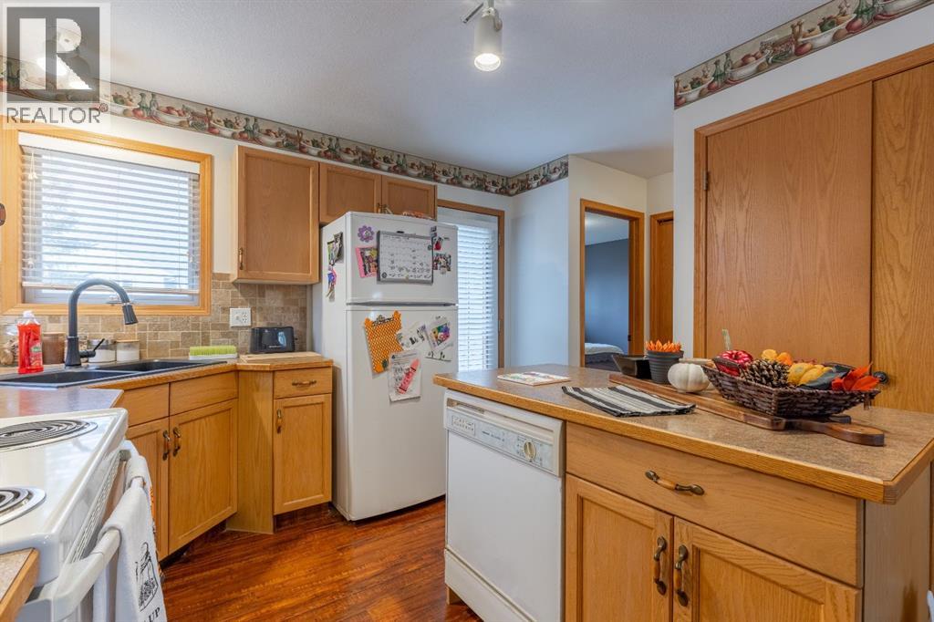 66 Assiniboia Way W, Lethbridge, Alberta  T1K 7L7 - Photo 14 - A2268734