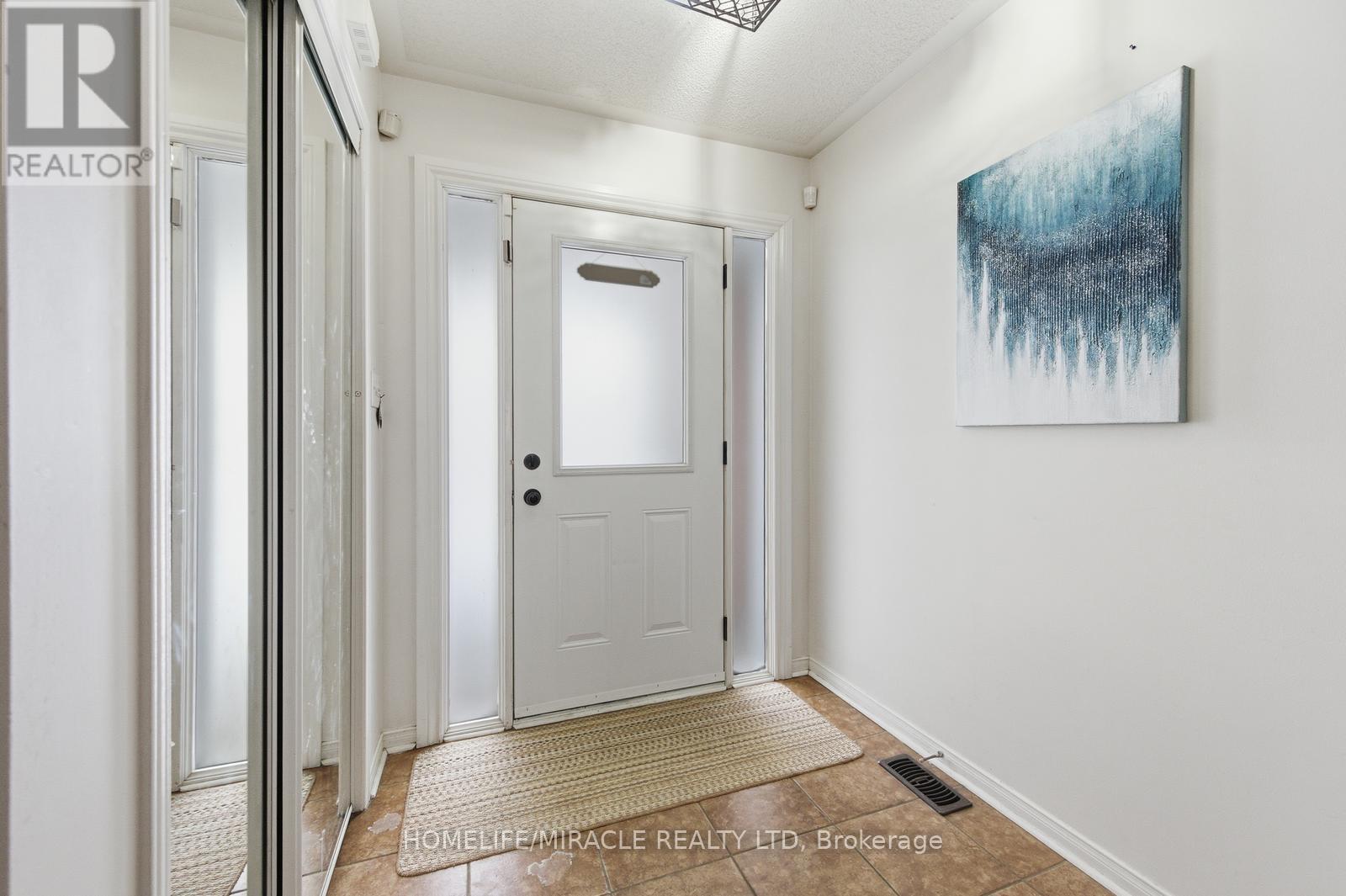 99 Spicebush Terrace, Brampton, Ontario  L6X 0J5 - Photo 4 - W12734334