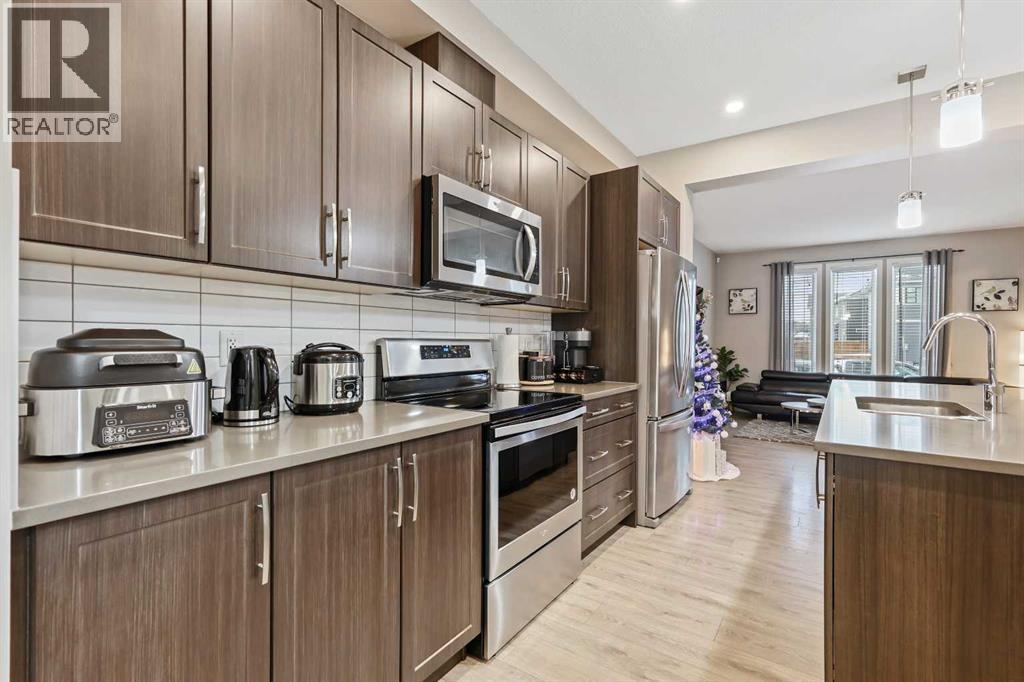 754 Belmont Drive Sw, Calgary, Alberta  T2X 4H4 - Photo 14 - A2275855