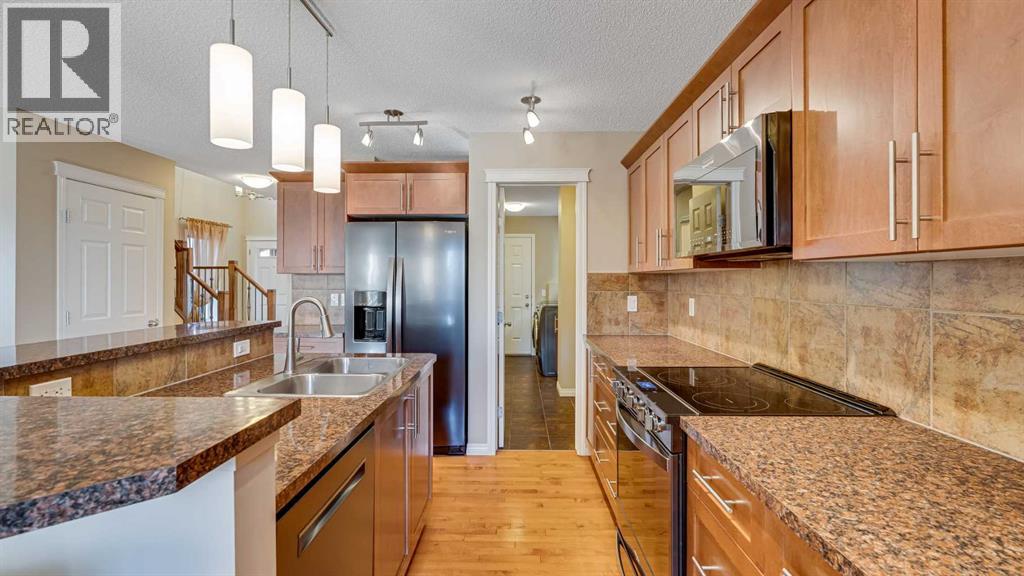 157 Bridleridge View Sw, Calgary, Alberta  T2Y 0E3 - Photo 9 - A2281181