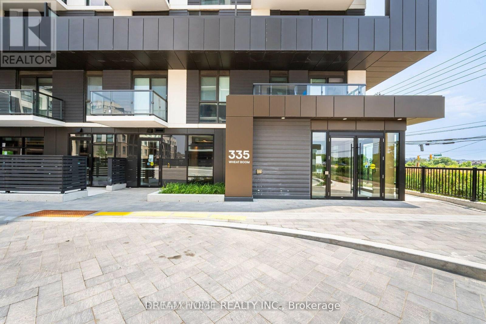 102 - 335 Wheat Boom Drive, Oakville, Ontario  L6H 0P4 - Photo 2 - W12734848