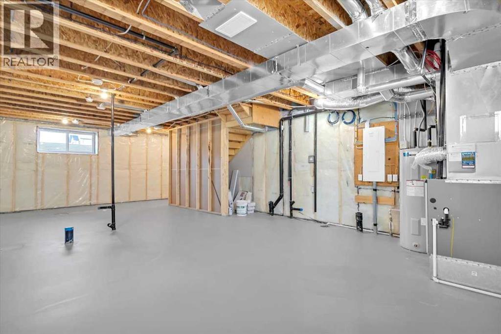 74 Wedderburn Drive, Okotoks, Alberta  T1S 5X2 - Photo 22 - A2277430