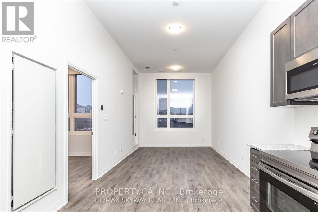 102 - 3265 Carding Mill Trail, Oakville, Ontario  L6M 5P7 - Photo 2 - W12735662