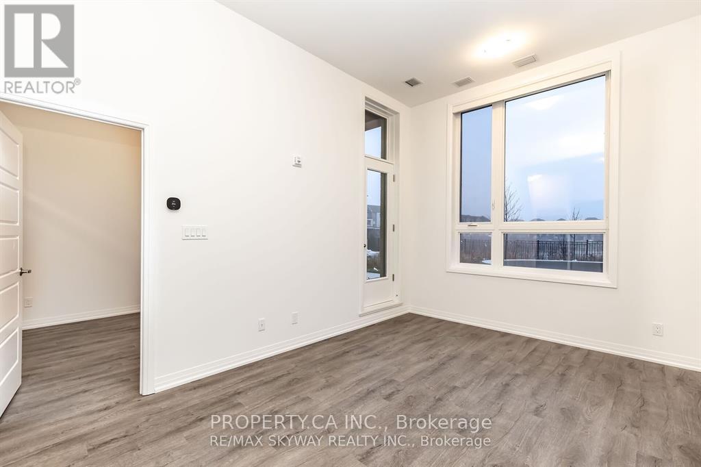 102 - 3265 Carding Mill Trail, Oakville, Ontario  L6M 5P7 - Photo 3 - W12735662