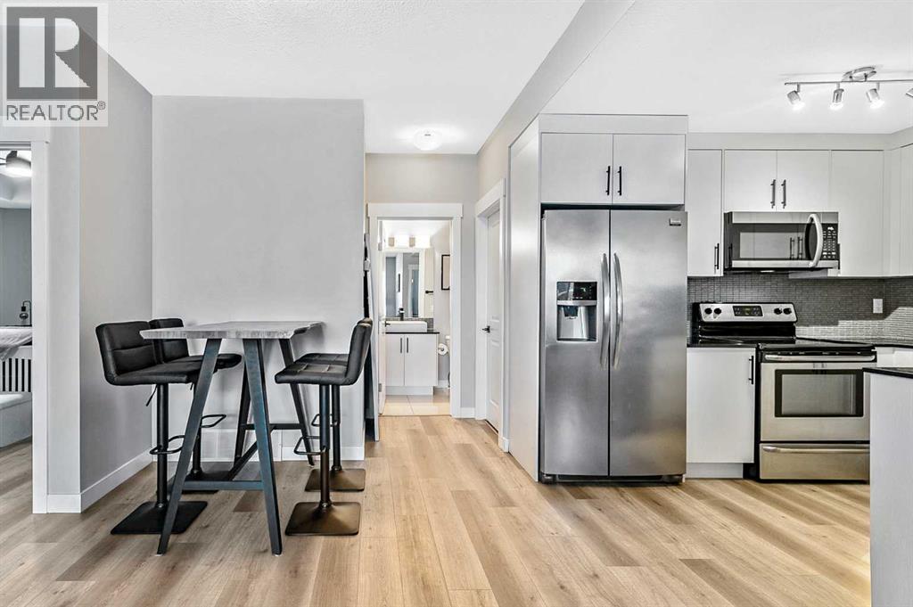 1, 67 West Coach Manor Sw, Calgary, Alberta T3H 1R7 - Photo 7 - A2273949