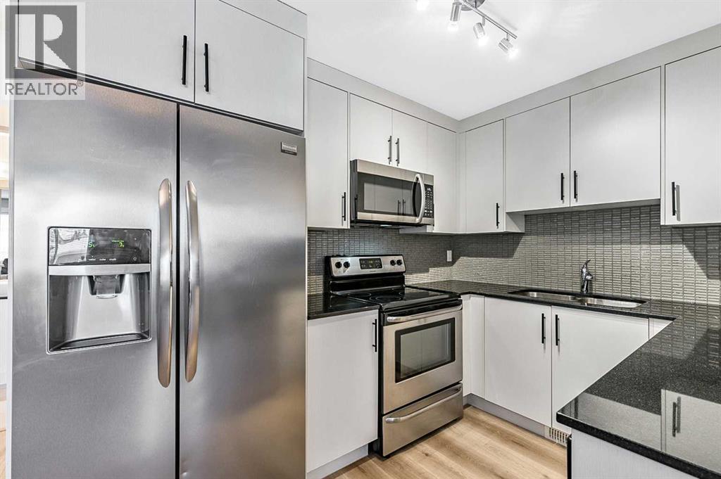 1, 67 West Coach Manor Sw, Calgary, Alberta T3H 1R7 - Photo 9 - A2273949