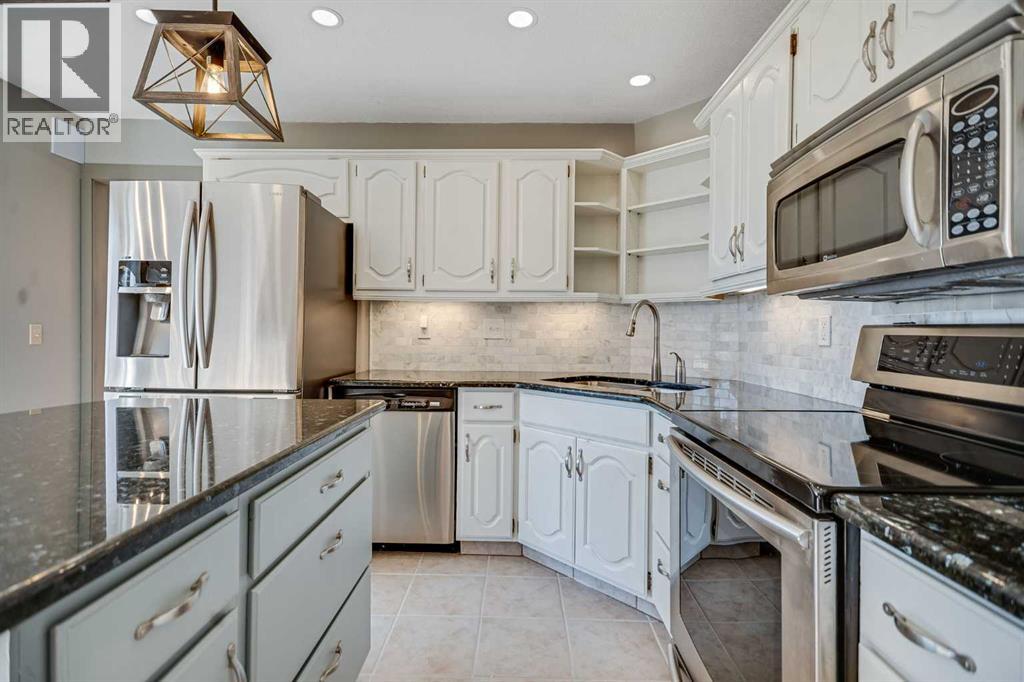 107 Wood Valley Drive Sw, Calgary, Alberta  T2W 5V6 - Photo 11 - A2280805