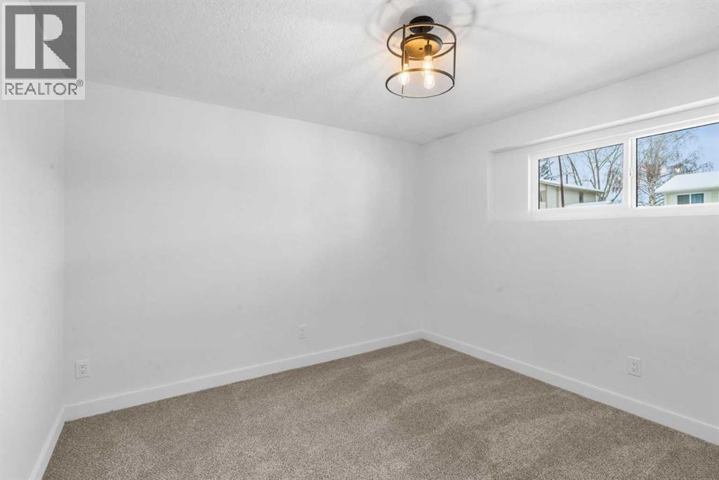 144 Deer Ridge Way Se, Calgary, Alberta  T2J 5Y6 - Photo 25 - A2274821