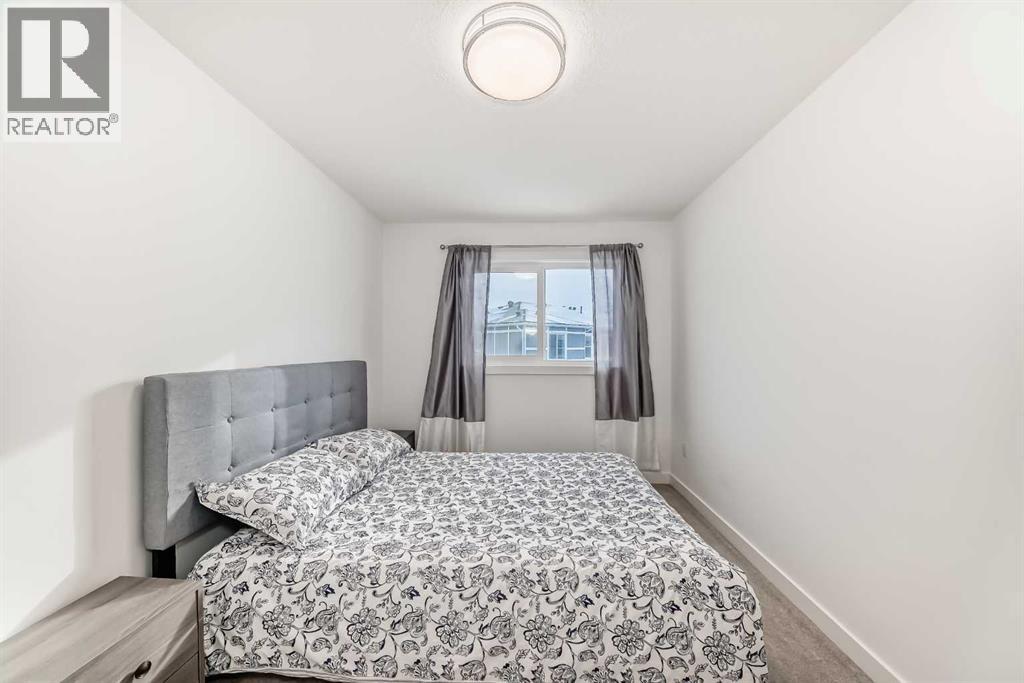 205, 33 Merganser Drive W, Chestermere, Alberta  T1X 2S2 - Photo 37 - A2281064