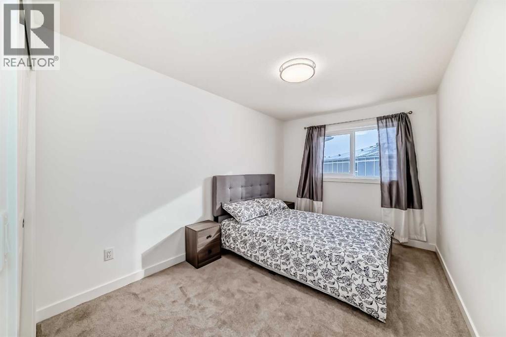 205, 33 Merganser Drive W, Chestermere, Alberta  T1X 2S2 - Photo 36 - A2281064