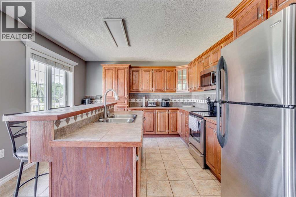 117 Cheecham Court, Anzac, Alberta  T0P 1J0 - Photo 30 - A2282368