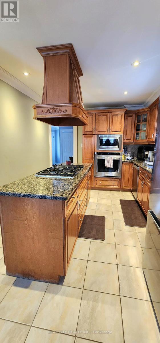 229 Kingsbridge Garden Circle, Mississauga, Ontario  L5R 1L4 - Photo 8 - W12736976