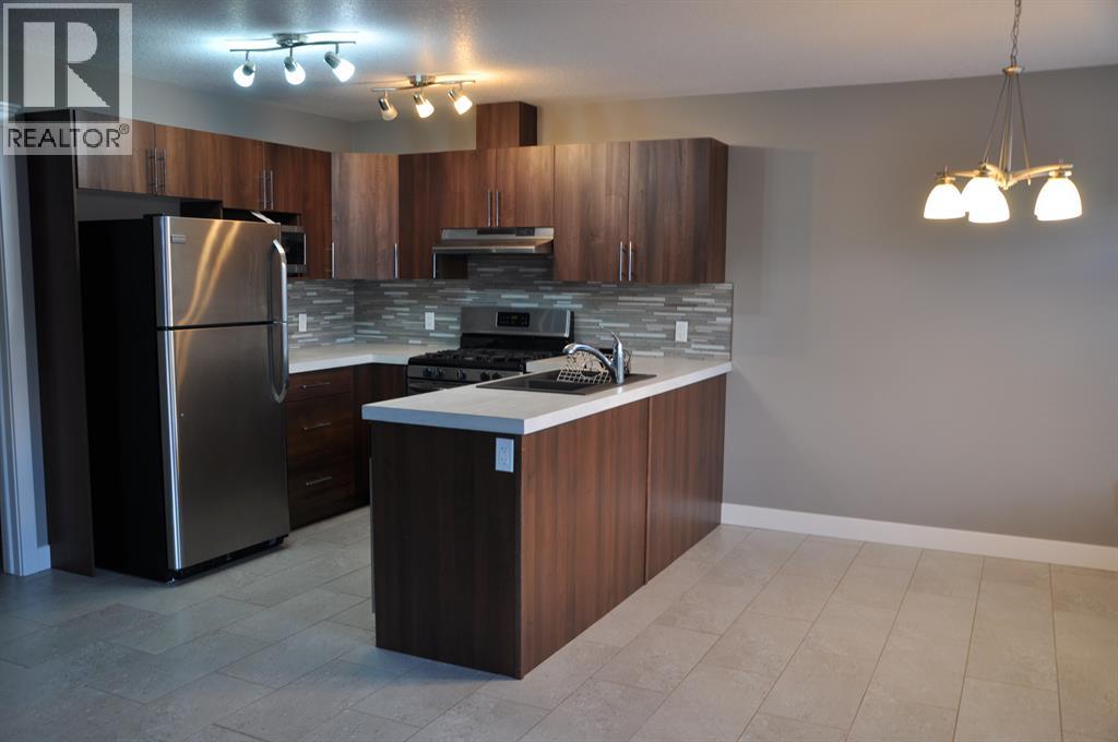 B, 11314 105 Avenue, Grande Prairie, Alberta  T8V 3Z3 - Photo 4 - A2282390