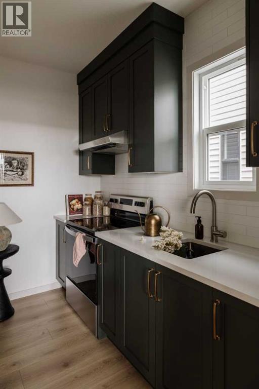 1062 Bayview Crescent Sw, Airdrie, Alberta  T4B 5N8 - Photo 6 - A2281444