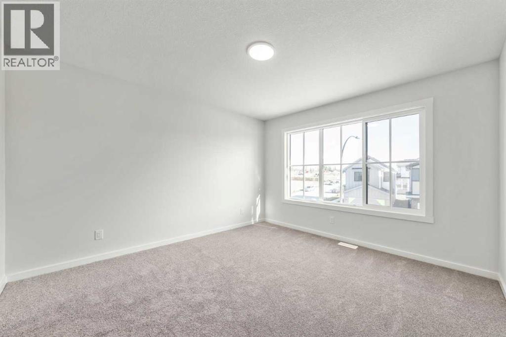 8 Heritage Link, Cochrane, Alberta  T4C 2J8 - Photo 19 - A2275137