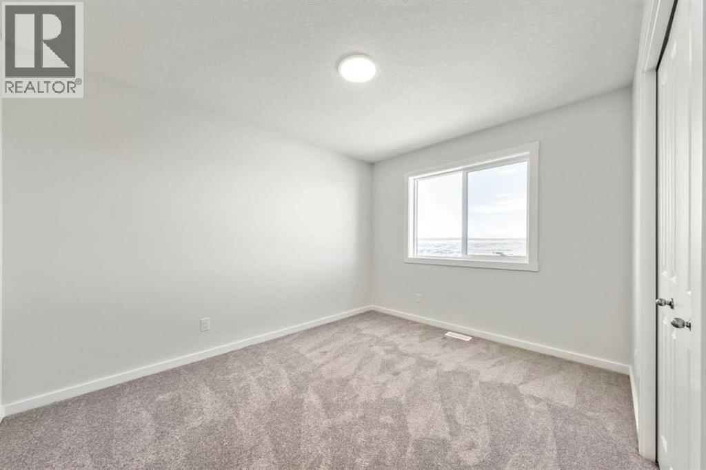 8 Heritage Link, Cochrane, Alberta  T4C 2J8 - Photo 26 - A2275137