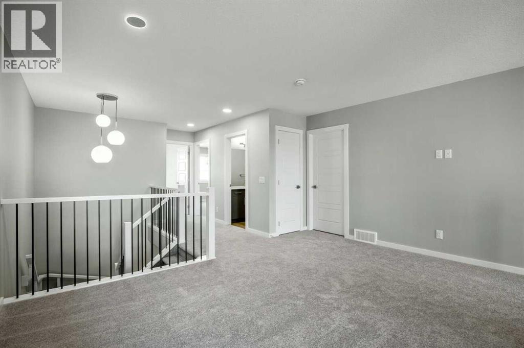 11 Heritage Link, Cochrane, Alberta  T4C 2J8 - Photo 10 - A2275697