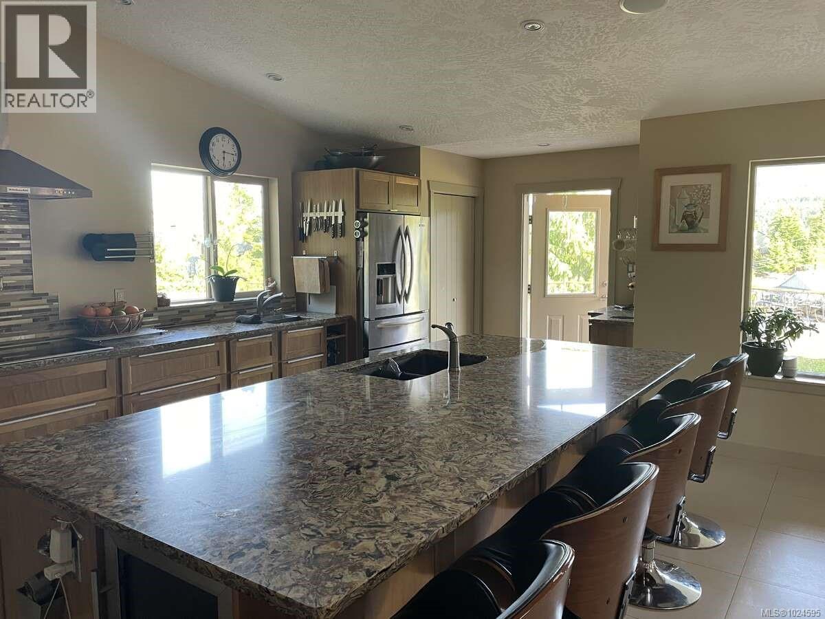 1680 Peligren Pl, Qualicum Beach, British Columbia  V9K 2S3 - Photo 4 - 1024595