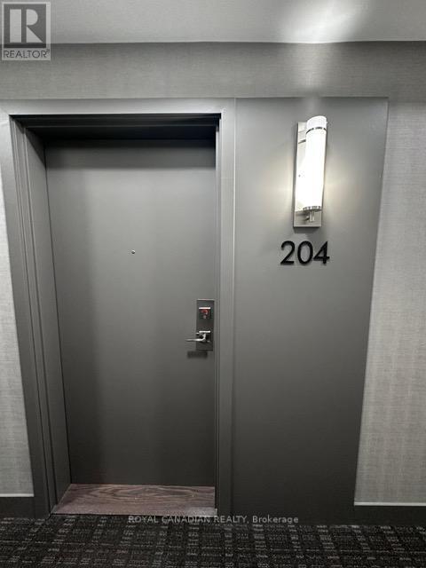 204 - 165 Canon Jackson Drive W, Toronto, Ontario  M6M 2G1 - Photo 3 - W12737372