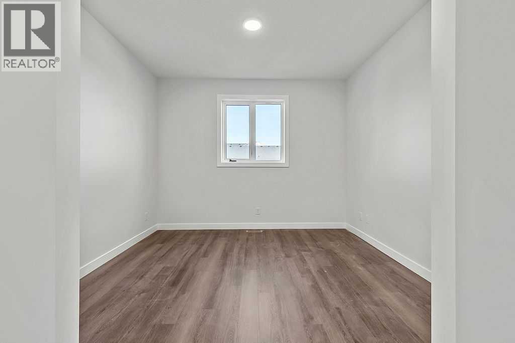 71 Southborough Crescent, Cochrane, Alberta  T4C 3J3 - Photo 11 - A2273098