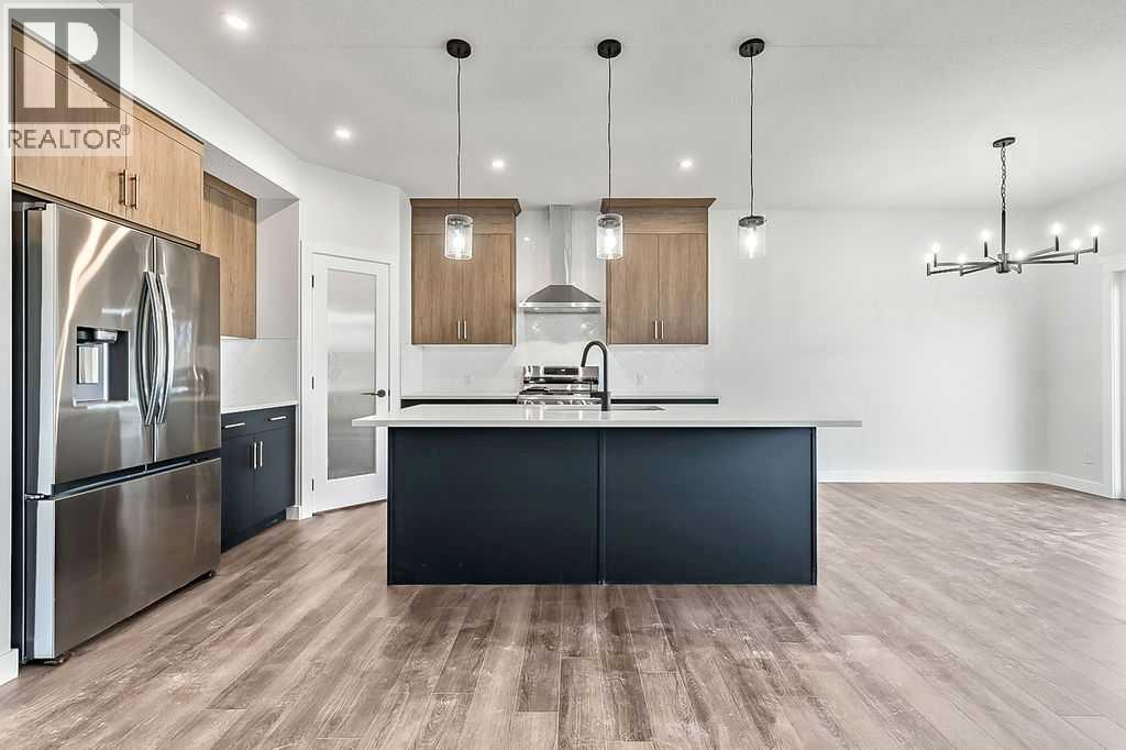 71 Southborough Crescent, Cochrane, Alberta  T4C 3J3 - Photo 4 - A2273098