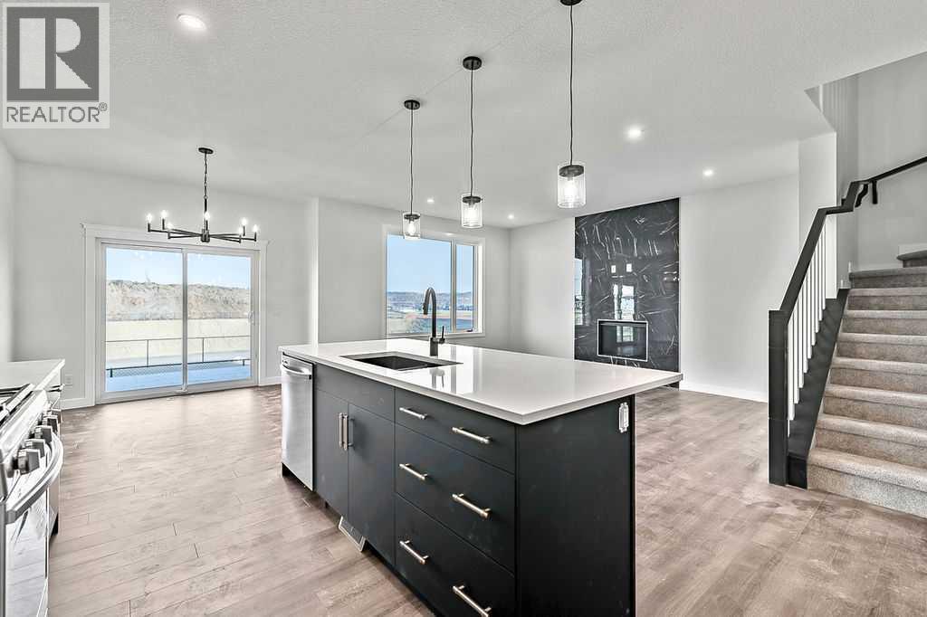 71 Southborough Crescent, Cochrane, Alberta  T4C 3J3 - Photo 7 - A2273098