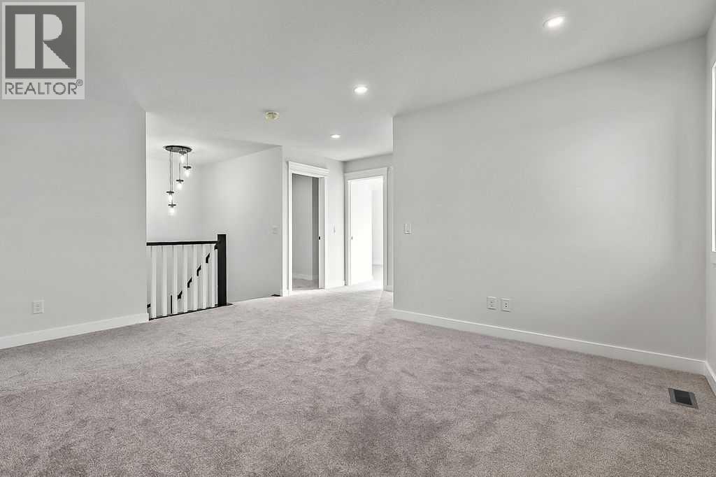 71 Southborough Crescent, Cochrane, Alberta  T4C 3J3 - Photo 15 - A2273098