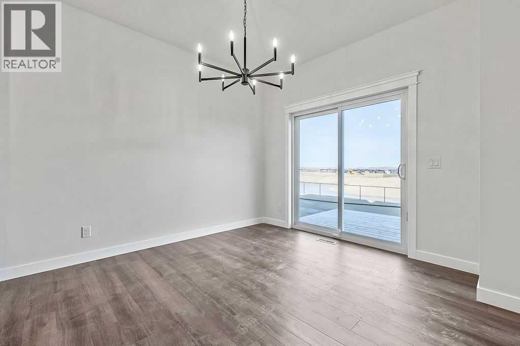 71 Southborough Crescent, Cochrane, Alberta  T4C 3J3 - Photo 8 - A2273098