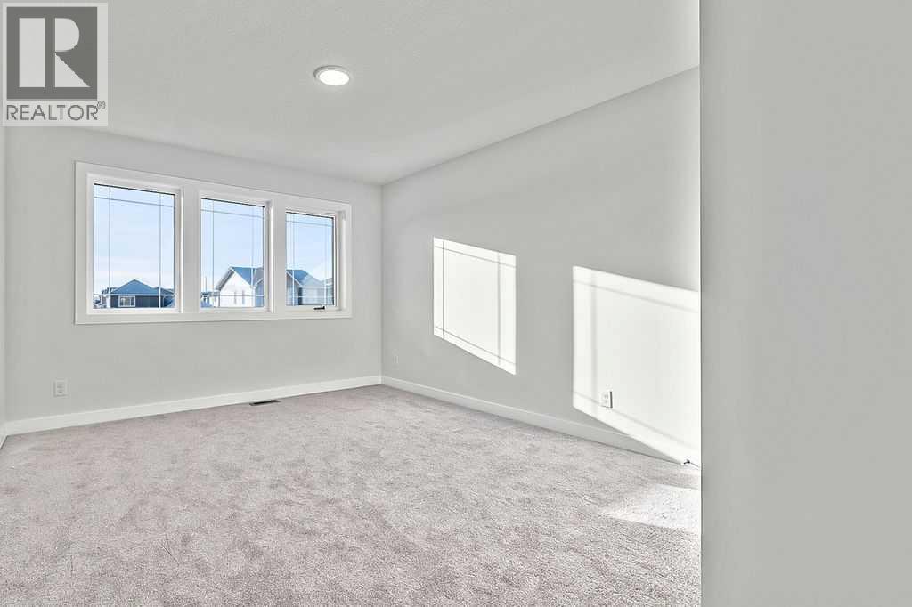 71 Southborough Crescent, Cochrane, Alberta  T4C 3J3 - Photo 21 - A2273098