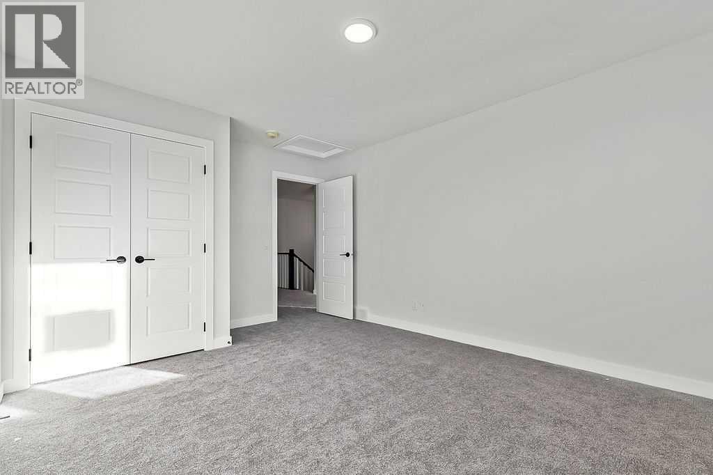 71 Southborough Crescent, Cochrane, Alberta  T4C 3J3 - Photo 22 - A2273098