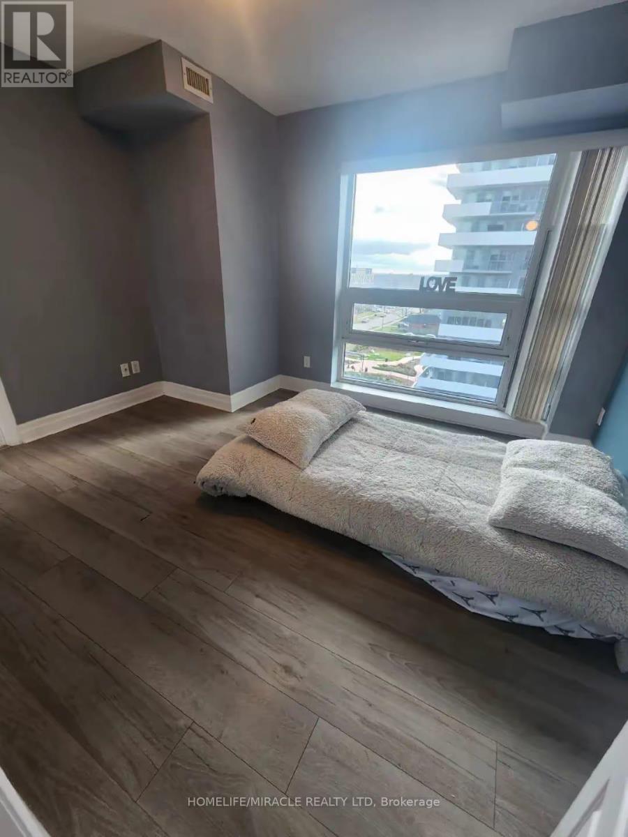 707 - 215 Queen Street E, Brampton, Ontario  L6W 0A9 - Photo 4 - W12737732