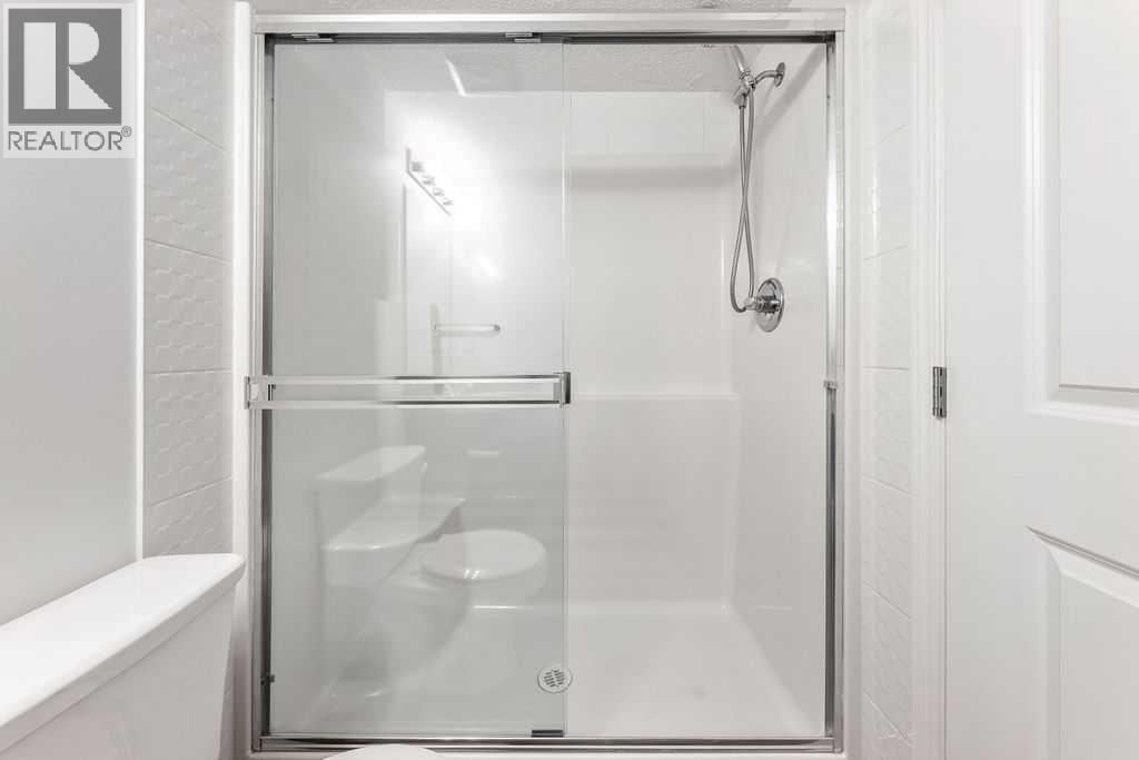 9113, 403 Mackenzie Way Sw, Airdrie, Alberta  T4B 3V7 - Photo 12 - A2273359