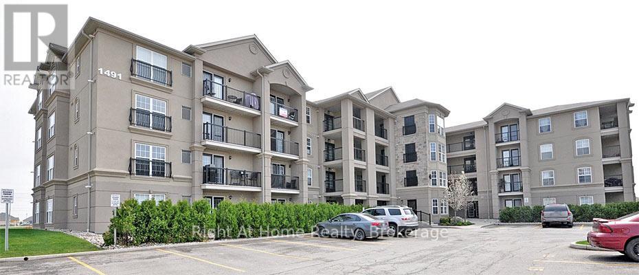 202 - 1487 Maple Avenue, Milton, Ontario  L9T 0B7 - Photo 1 - W12738782