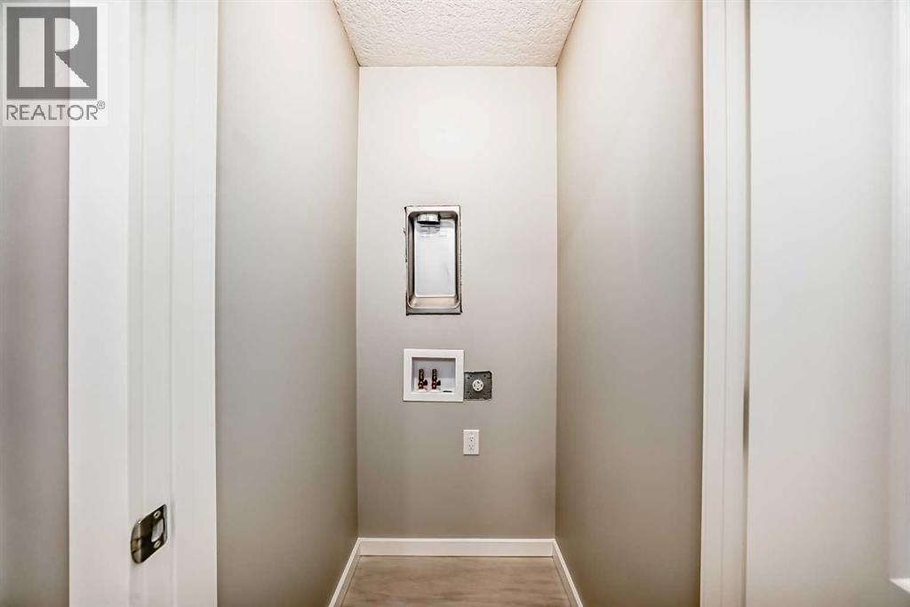 92 Creekside Rise Sw, Calgary, Alberta  T2X 6G8 - Photo 32 - A2278705