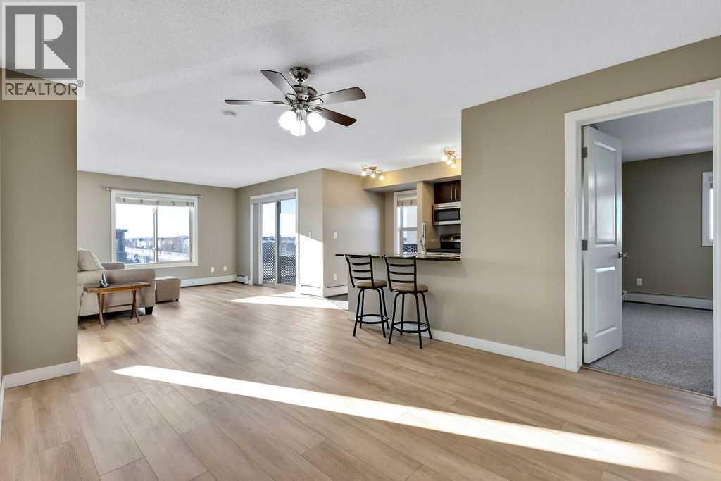 7402, 403 Mackenzie Way Sw, Airdrie, Alberta  T4B 3V7 - Photo 1 - A2278236