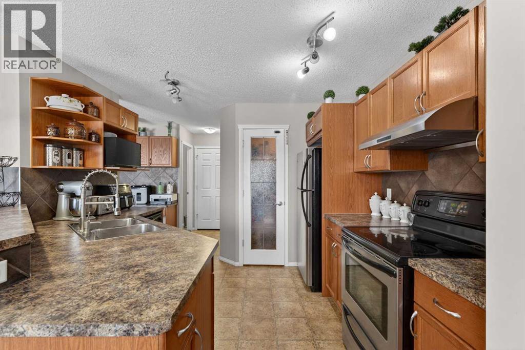 106 Saddlecrest Crescent Ne, Calgary, Alberta  T3J 0C5 - Photo 7 - A2276159