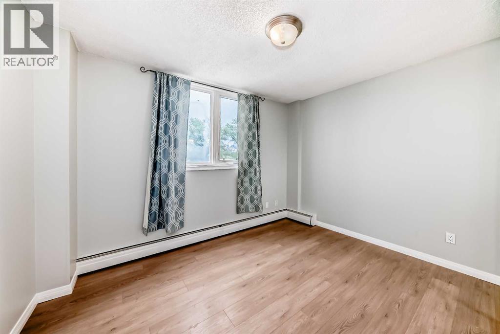 303, 314 14 Street Nw, Calgary, Alberta  T2N 1Z8 - Photo 18 - A2277640