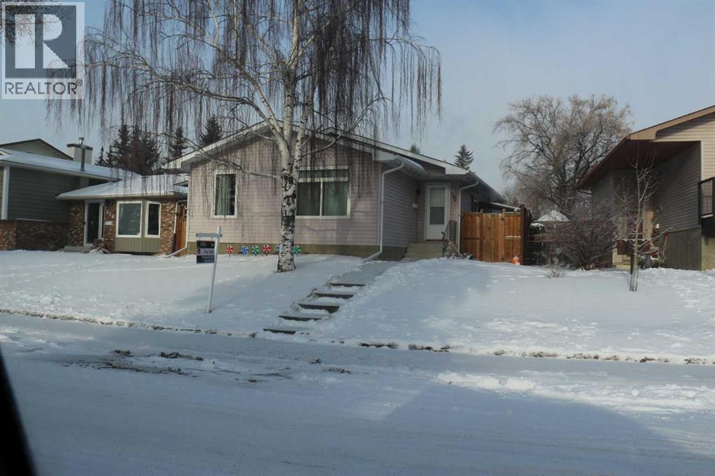 112 Woodvale Road Sw, Calgary, Alberta  T2W 3M8 - Photo 2 - A2275374