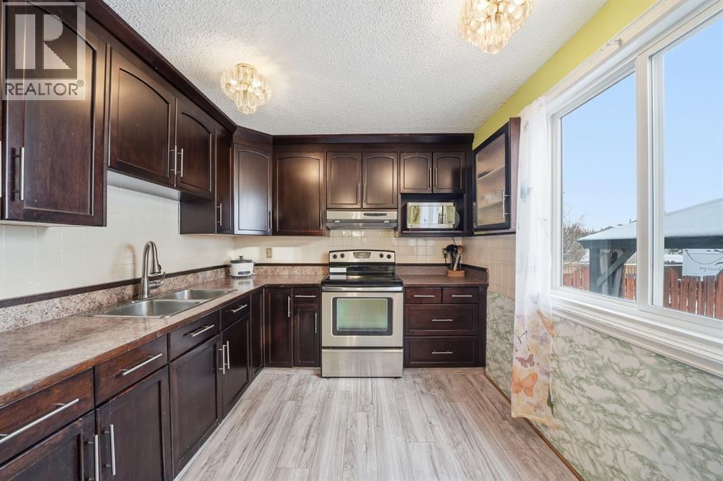 6411 26 Avenue Ne, Calgary, Alberta  T1Y 4H2 - Photo 7 - A2282498